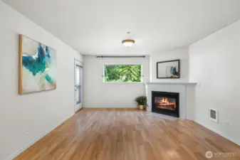 Great room with gas fireplace and access to back deck