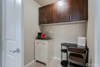 Multipurpose area with GFCIs, vent, and sink can be kitchenette, small office, laundry room, utility room etc. Add a divider and lower level can be a separate unit from upstairs. Stackable Laundry now in Garage. Can convert back easily to this room as needed too.
