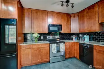 Black and stainless steel appliances.