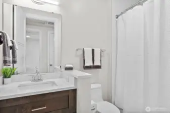 A lovely second full bath.