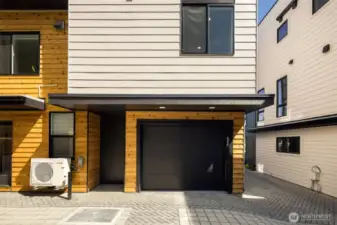 A spacious garage and private entrance—welcome home.