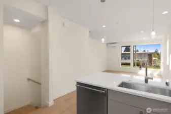 Photos of model home with similar finishes & floor plan.