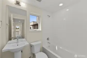Photos of model home with similar finishes & floor plan.