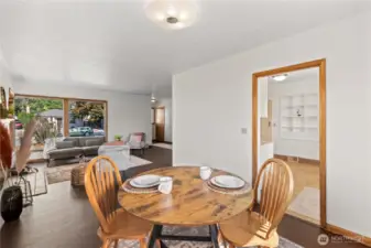Enjoy casual meals or morning coffee in this bright dining nook that seamlessly connects to the living room, creating an open and inviting feel.