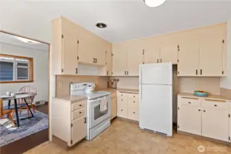 A bright and inviting kitchen that connects seamlessly to the dining area, creating an effortless flow for cooking and entertaining.
