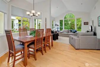 Sun drenched main level with vaulted living and dining room.