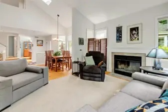 Wood burning fireplace. Dining area with sunny skylight.