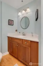Main level half bath, perfect for entertaining.