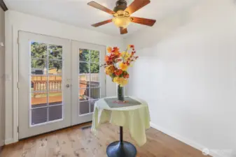 Dining area off of the kitchen leading to the french doors & the brand new deck ...