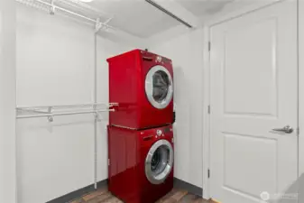 In unit washer and dryer located in the closet of the bedroom