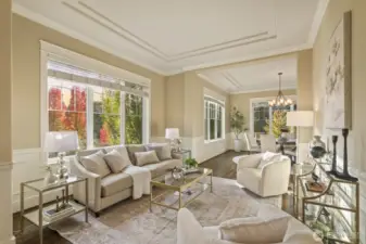 Tall ceilings and abundant windows fill every space with year-round light and views of nature.