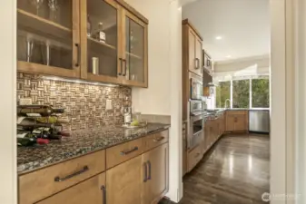 Flow through the butler's pantry into the kitchen for ease of serving and hosting.