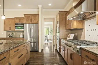 Abundant storage and counter space, double ovens, high-end appliances by Viking and Miele - you'll love to spend time in this space.