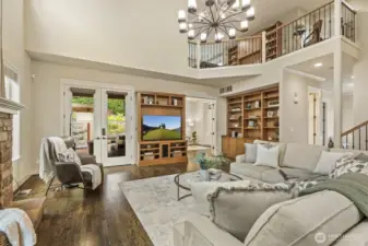 Imagine lazy mornings and cozy evenings gathered here with friends, watching movies or Kraken games, spreading holiday cheer, or flowing out to the outdoor living area.