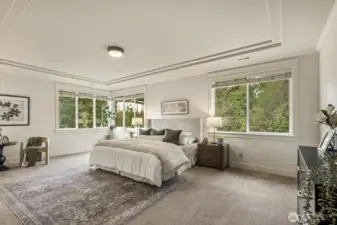 Head upstairs to check out all four bedrooms, including this sumptuous primary suite!