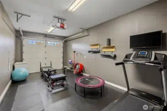 Single car garage, with entrance to the kitchen. Subs for a fitness area or extra storage.