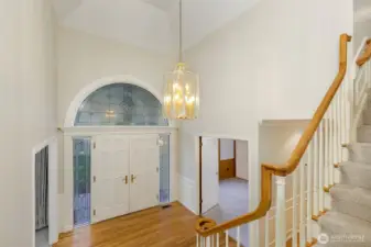 Gorgeous entry with high ceilings and dramatic staircase leading to upper level bedrooms and huge bonus room.