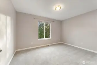 Three generously sized bedrooms are located upstairs, offering flexibility and comfort for guests or household members.