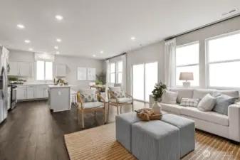 Very open concept with lots of windows for natural light into the heart of the home. Actual home is under construction. Colors, materials, and features may vary. See site agent for details.