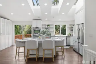 Dining area + kitchen (staged)