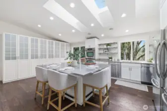 Dining area + kitchen (staged)