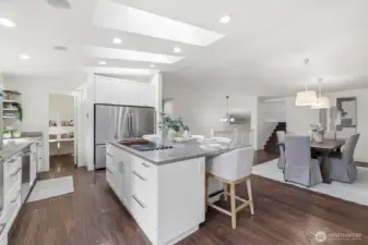 Dining area + kitchen (staged)