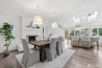 Dining area + kitchen (staged)