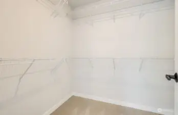 Large walk-in closet in primary bedroom