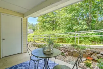 This view is priceless.  Quiet and private, this patio is the perfect spot for a little gardening, relaxing and enjoying life.  The paved ramp allows for zero step accessibility to the condo.