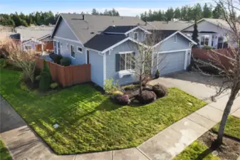 Beautiful corner lot with outdoor fireplace, garden, shed and hot tub!