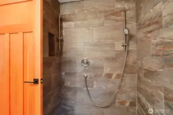 Bathroom features walk-in shower.