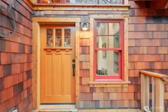 Beautiful cedar shingles compliment the natural setting.