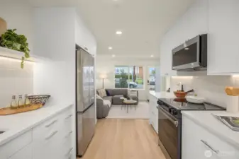 Photos of model home with similar finishes & floor plan.