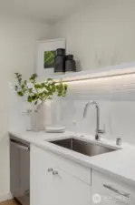 Photos of model home with similar finishes & floor plan.