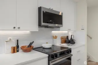 Photos of model home with similar finishes & floor plan.