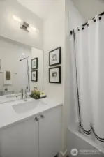 Photos of model home with similar finishes & floor plan.