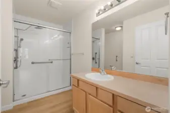 Guest hallway bathroom with custom walk in shower: glass surround, and rainhead