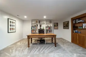 Secondary office space, with a built-in wooden bookcase that holds more than great literature!