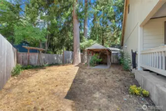 Nice sized side yard. Gazebo, fully fenced yard, mature landscaping.