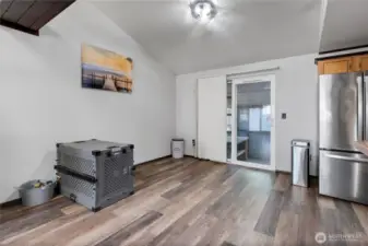 Closer view of the dining room with slider out to your sunroom