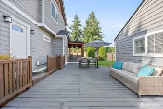 Large decking between house and garage
