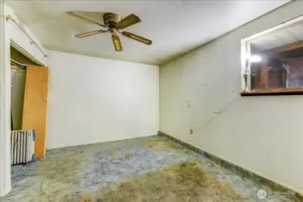 This is the converted garage, that could be changed back, or complete the finishing off for a 4th bedroom