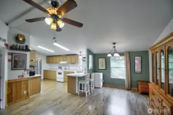 Great room concept with vaulted ceilings and plenty of light.