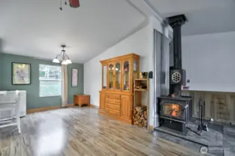 Dining area open to kitchen makes easy.