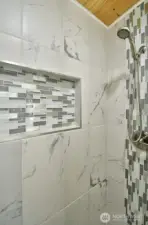 Custom tile surround shower.