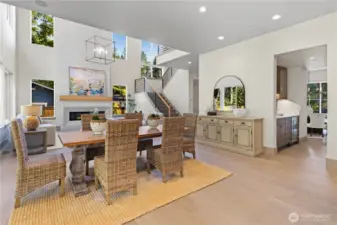 Wide-open great room with oversized breakfast nook, long wall for a buffet, wet bar pass through to the formal dining.