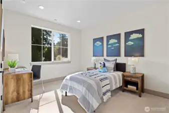 One of two oversized upstairs bedrooms that mirror one another and both enjoy walk-in closets. This room can easily hold a queen bed with two night stands...it's much larger than it appears.