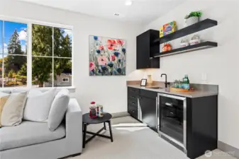 Big beautiful sun-kissed bonus room. Entertainer's bar with slab quartz countertops, bar sink, upper cabinet, base cabinet with drawers, and open shelving with LED lights. Under counter beverage chiller.
