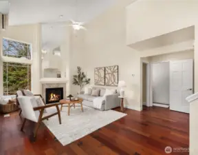Bright living room with vaulted ceilings.