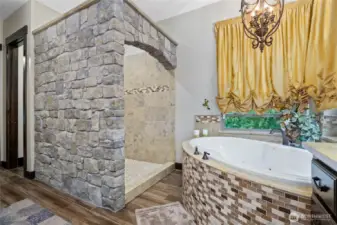 Stone shower and soaker tub